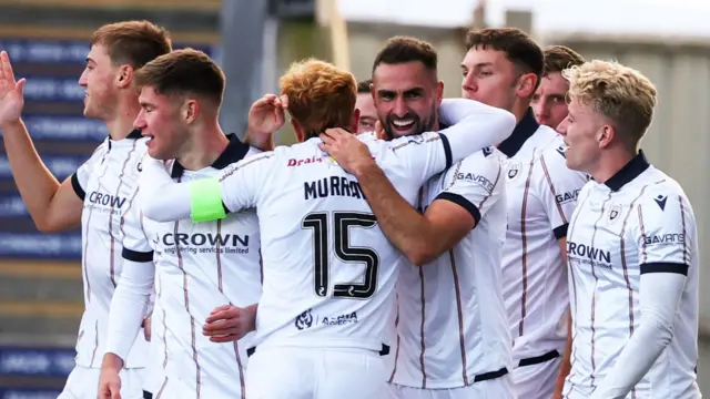 Dundee players celebrating