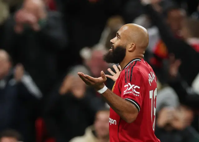 Manchester United's Bryan Mbeumo celebrates scoring their third goal