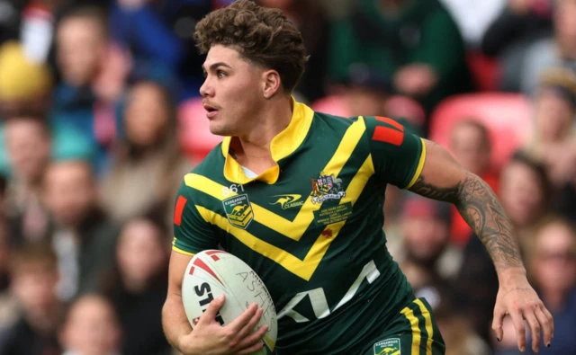Australia's Reece Walsh in action