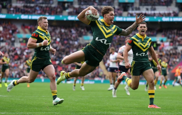 Australia's Reece Walsh scores