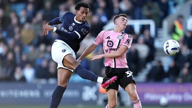 Femi Azeez opens the scoring for Millwall against Leicester