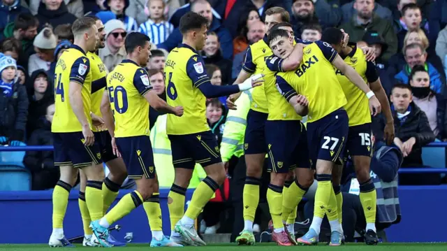 Oxford players celebrate Will Lankshear's goal at Sheffield Wednesday