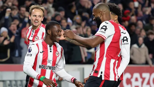 Dango Ouattara of Brentford celebrates