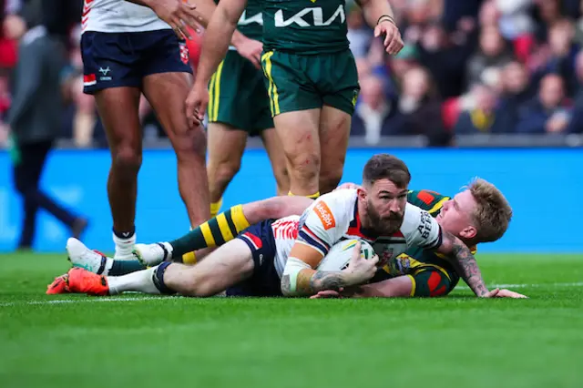 Daryl Clark of England scores
