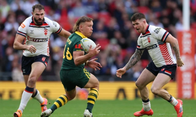 Australia's Reuben Cotter in action with England's John Bateman