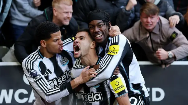 Bruno Guimaraes of Newcastle United celebrates with his teammates