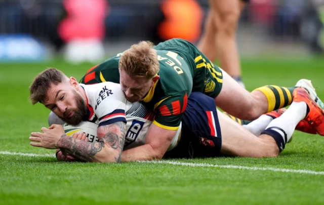 England's Daryl Clark scores a try