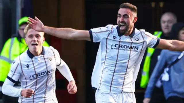 Dundee’s Clark Robertson celebrates after scoring to make it 1-0 during a William Hill Premiership match between Falkirk and Dundee at the Falkirk Stadium,