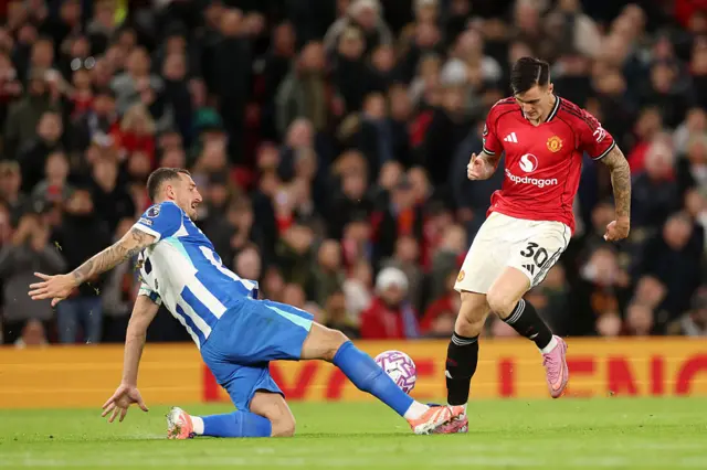 Benjamin Sesko is tackled by Lewis Dunk