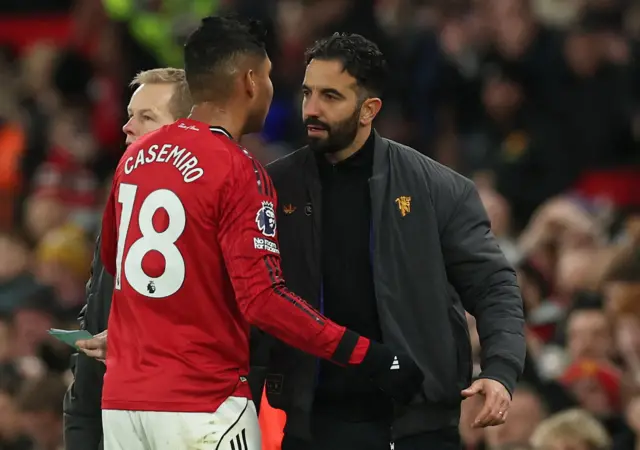 Manchester United's Casemiro with Manchester United manager Ruben Amorim after being substituted