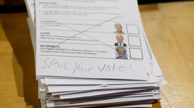 A spoiled vote at the count centre for the Irish presidential election, in Dublin. A pencil cross has been drawn across all candidates with Spoil Your Vote written at the bottom
