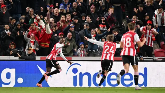 Dango Ouattara of Brentford celebrates scoring his team's first goal