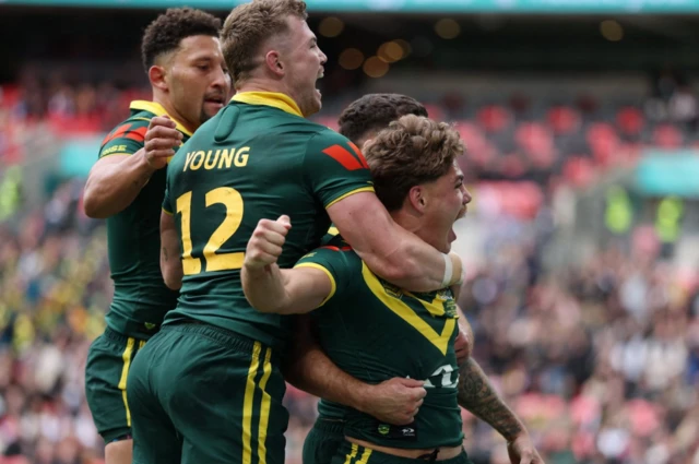 Australia's Reece Walsh celebrates