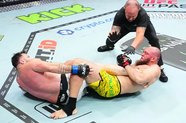 Valter Walker of Brazil secures a heel hook submission against Louie Sutherland
