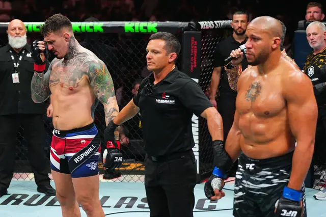 The UFC heavyweight championship fight between Tom Aspinall (L) and Ciryl Gane (R) is declared a no-contest