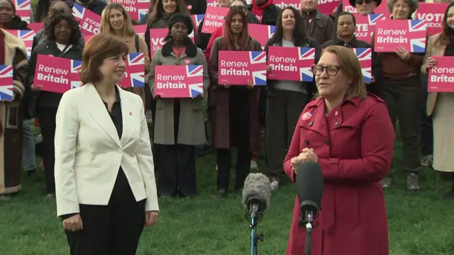 Lucy Powell next to Anna Turley in front of Labour supporters outside