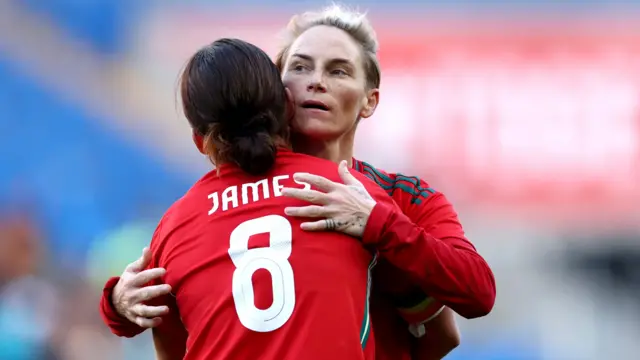 Jess Fishlock hugs Angharad James