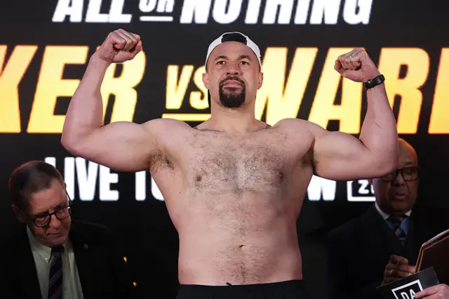 Joseph Parker with his biceps flexed