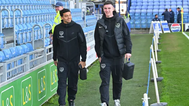 Portsmouth's Andre Dozzell and Makenzie Kirk arrive at Fratton Park