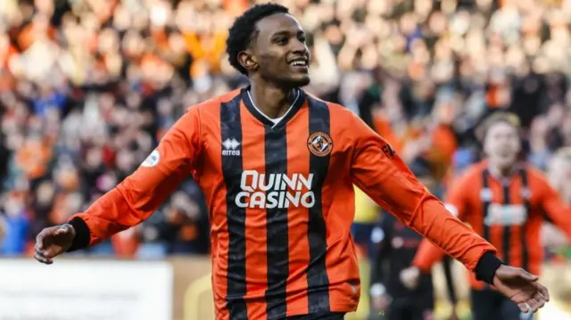 Amar Fatah celebrates after scoring a penalty for Dundee United against St Mirren