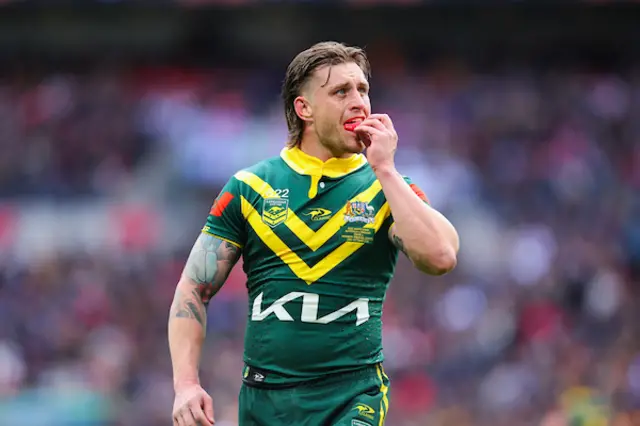 Cameron Munster of Australia looks on