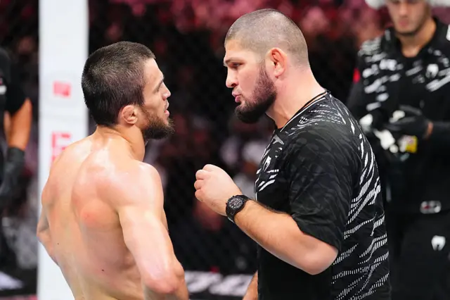 Umar Nurmagomedov of Russia talks with coach Khabib Nurmagomedov