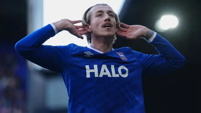 Jack Clarke cups his ears in celebration