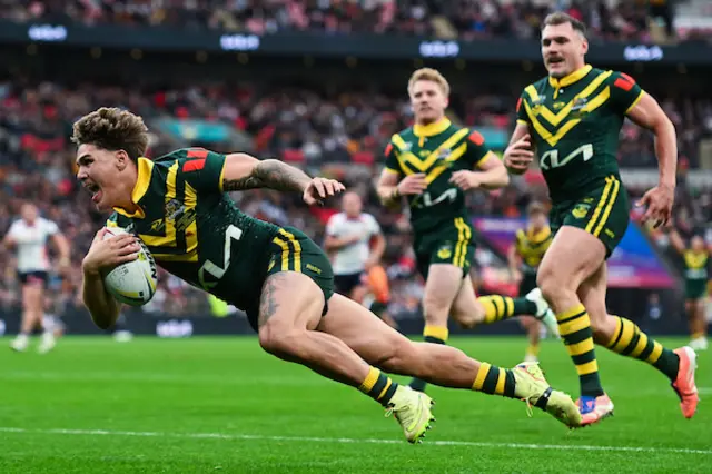Reece Walsh of Australia scoring a try