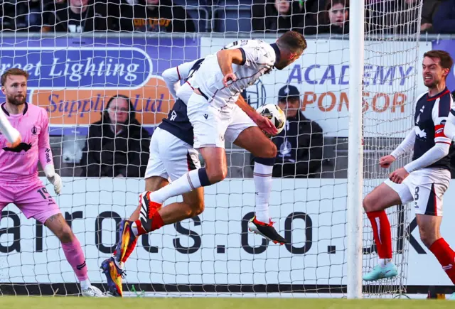 Dundee's Clark Robertson scores to make it 1-0 during a William Hill Premiership match between Falkirk and Dundee at the Falkirk Stadium,