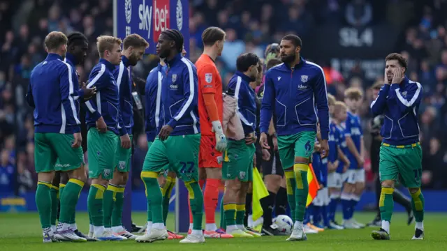 West Brom players ready themselves before kick-off