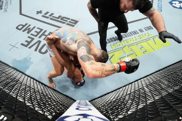 Tom Aspinall of England knocks out Tybura