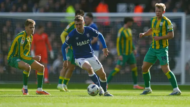 Ipswich's Jack Taylor tries to find space against West Brom