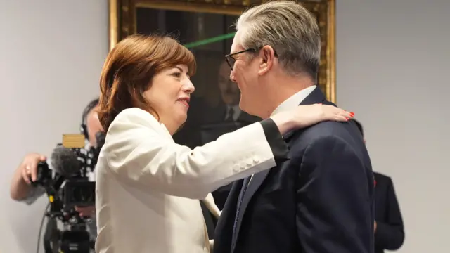 Powell hugs Starmer