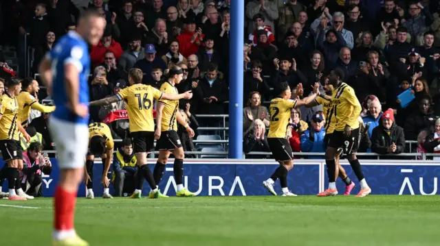 Soke players celebrate Hayden Matthews' own goal