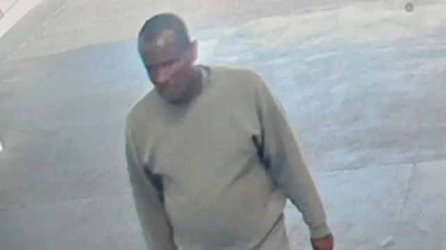 CCTV screenshot showing Kebatu in grey tracksuit in Chelmsford