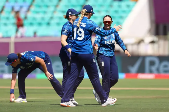 Alice Capsey and England celebrate a wicket