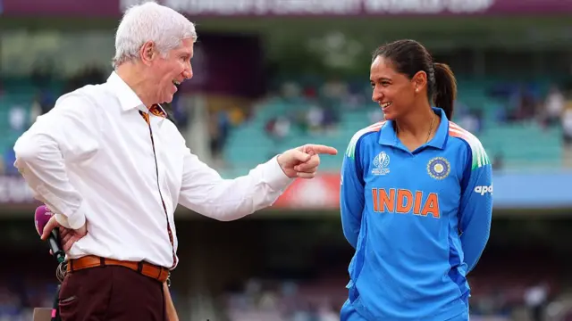 Commentator Alan Wilkins speaks to Harmanpreet Kaur of India