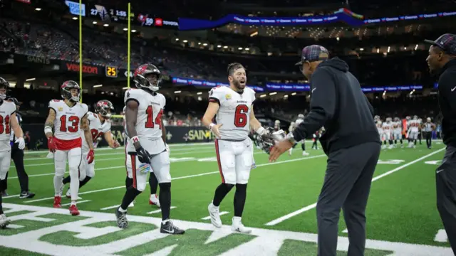 Baker Mayfield celebrates after scoring a touchdown against the New Orleans Saints