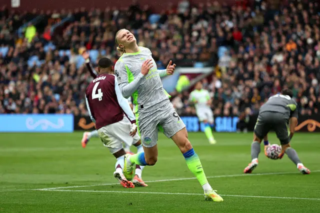 Erling Haaland reacts at Villa Park