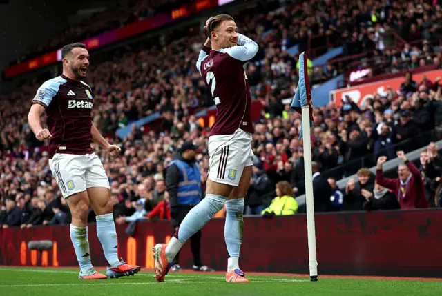 Matty Cash celebrates