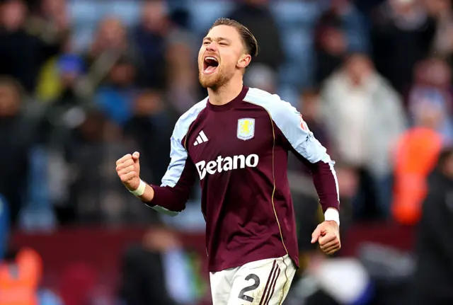 Matty Cash celebrates at Villa Park