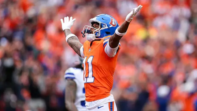 Troy Franklin celebrates his touchdown