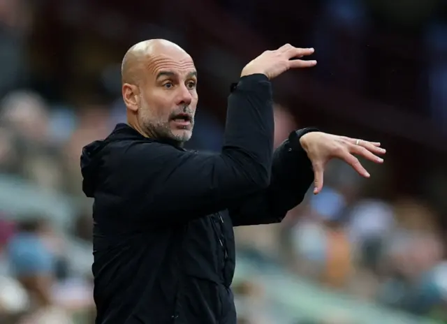 Pep Guardiola reacts
