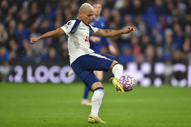 Richarlison shoots for Tottenham Hotspur against Everton
