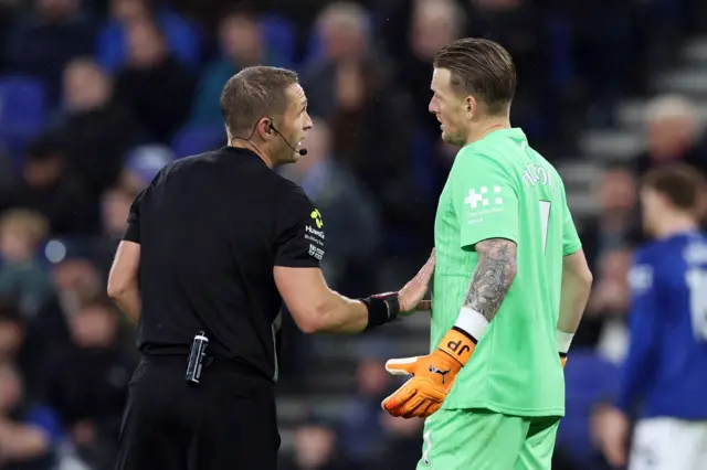 Everton's Jordan Pickford remonstrates with referee Craig Pawson.