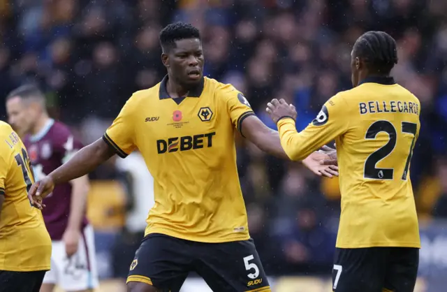 Wolverhampton Wanderers' Marshall Munetsi celebrates scoring their second goal with Wolverhampton Wanderers' Jean-Ricner Bellegarde