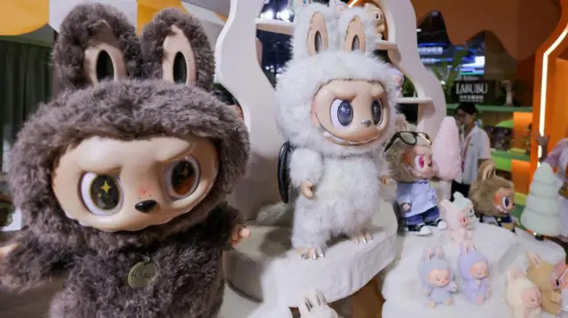 Labubus, furry dolls with humanoid faces, on display at a Pop Mart store in China