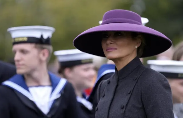 Melania Trump wears a wide-brimmed purple hat at Windsor Castle