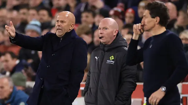 Liverpool manager Arne Slot and Keith Andrews
