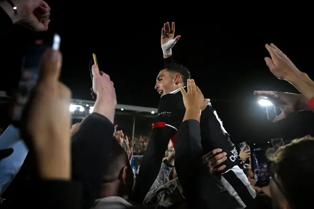 Grimsby celebrate beating Manchester United